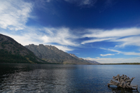 Mountains, water, and snag.../, , ...